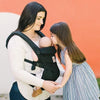 Black Ergonbaby Omni 360 All Position Carrier Mother and Baby